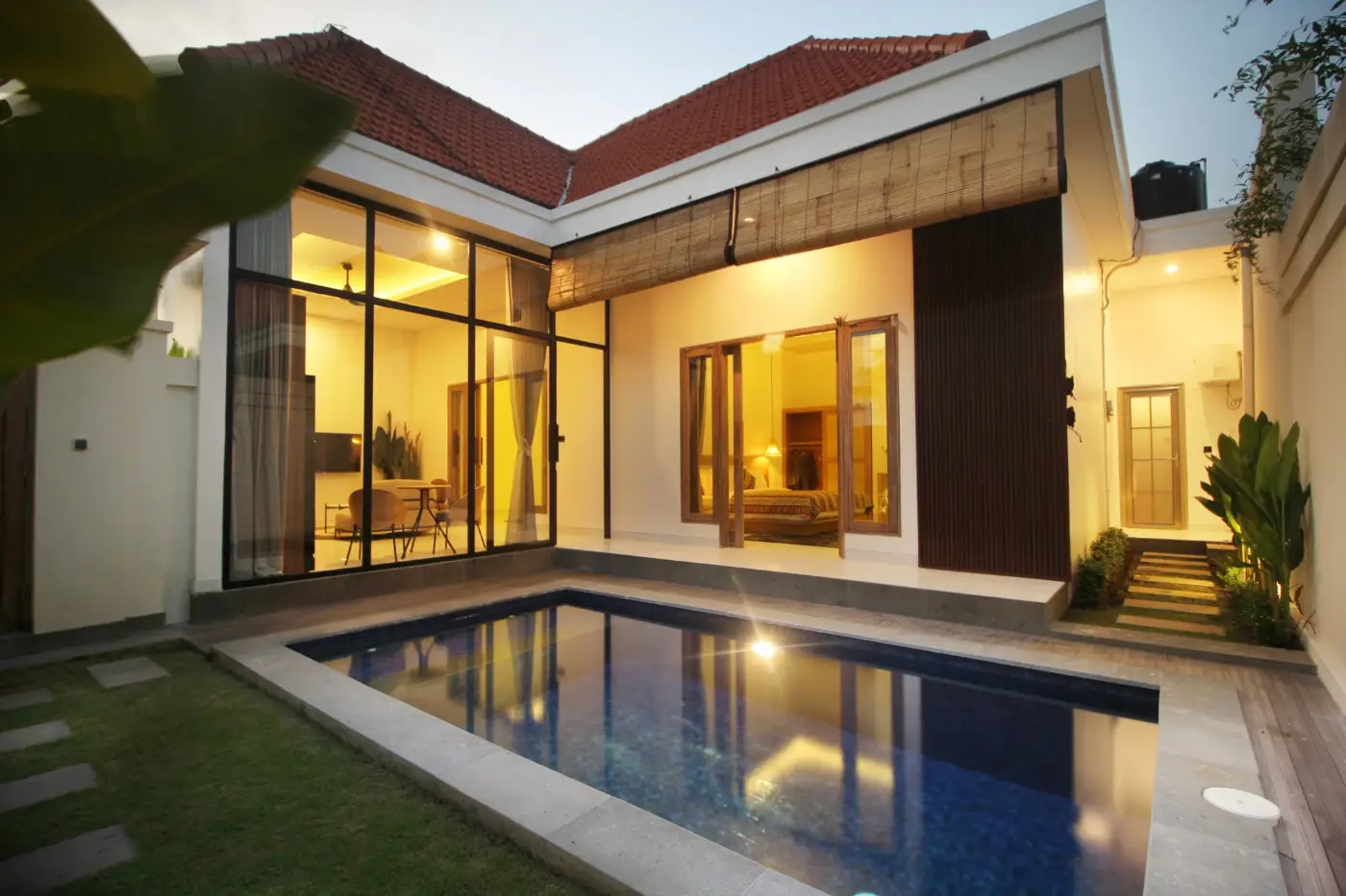 Casa Vana Seseh lit at dusk